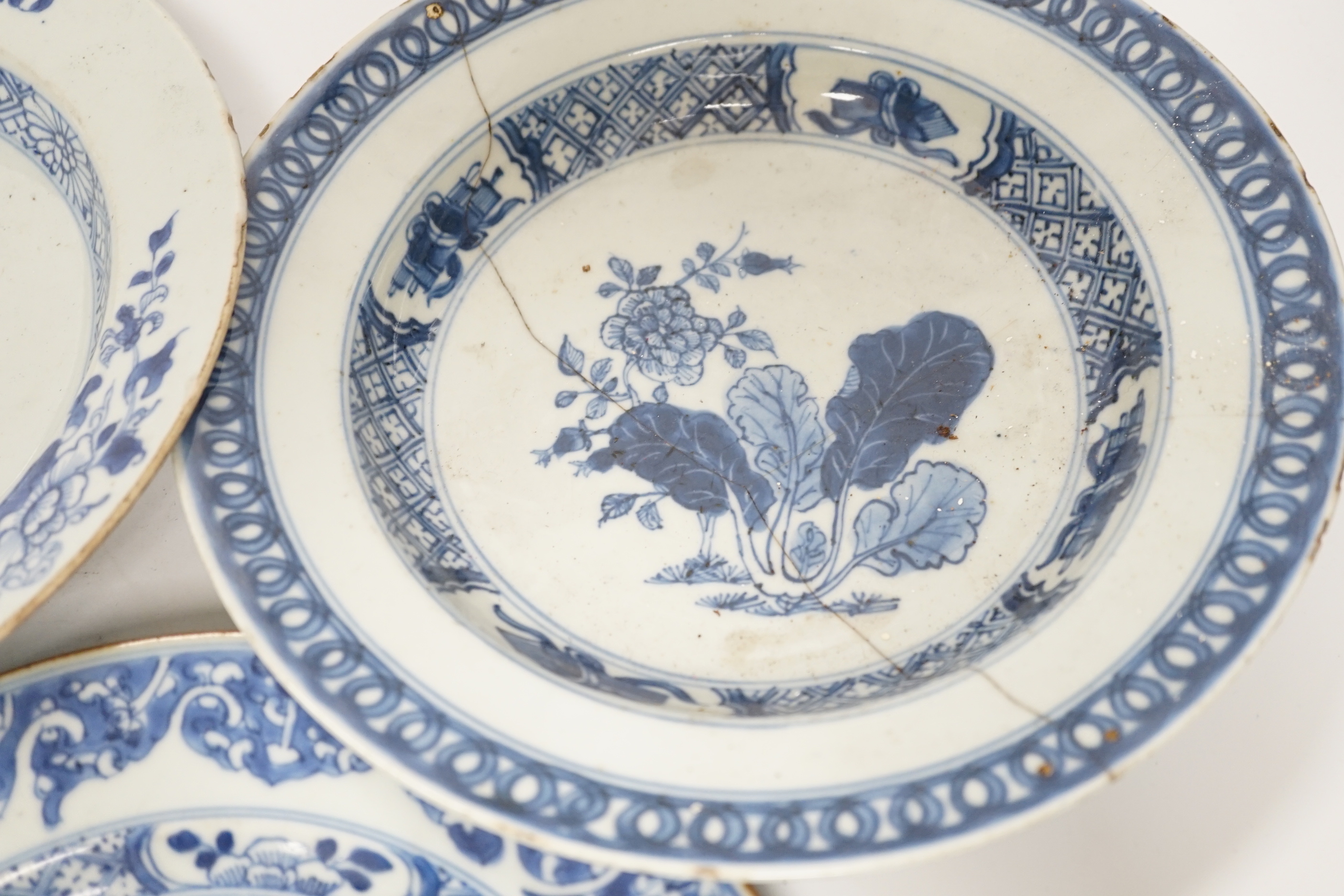 Six 18th century Chinese blue and white dishes and plates, largest 23cm diameter